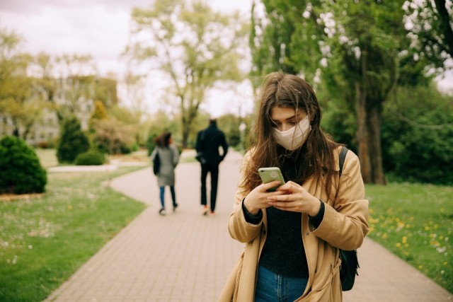 Image-of-phone-on-phone-wearing-mask-scaled