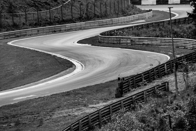 A black and white image of a chicane on a race track