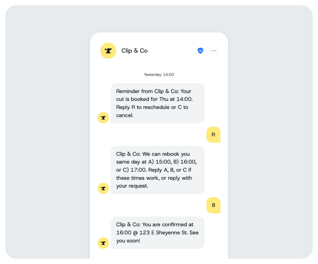 Example two-way SMS conversation from Clip & Co for rescheduling a haircut appointment and confirming the customer’s new booking time.